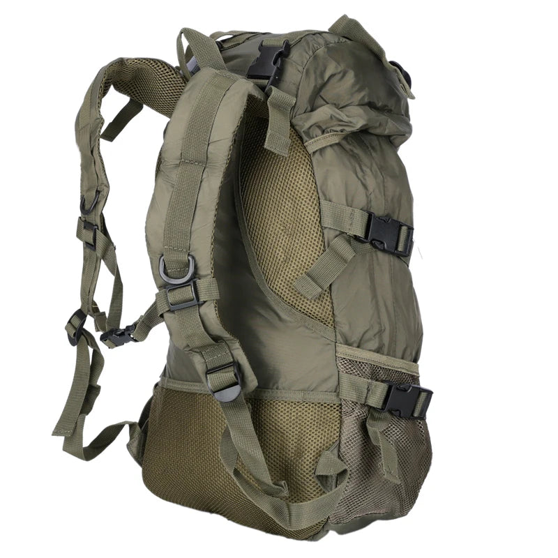 Olive green backpack with multiple straps and buckles on a white background