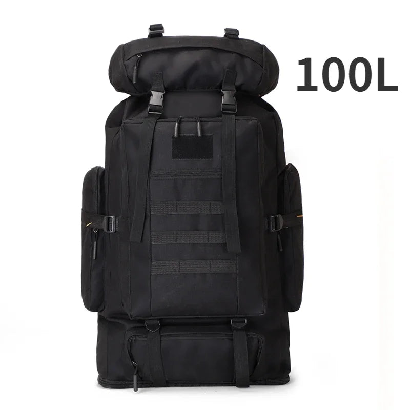 Black backpack with multiple straps and compartments on a white background